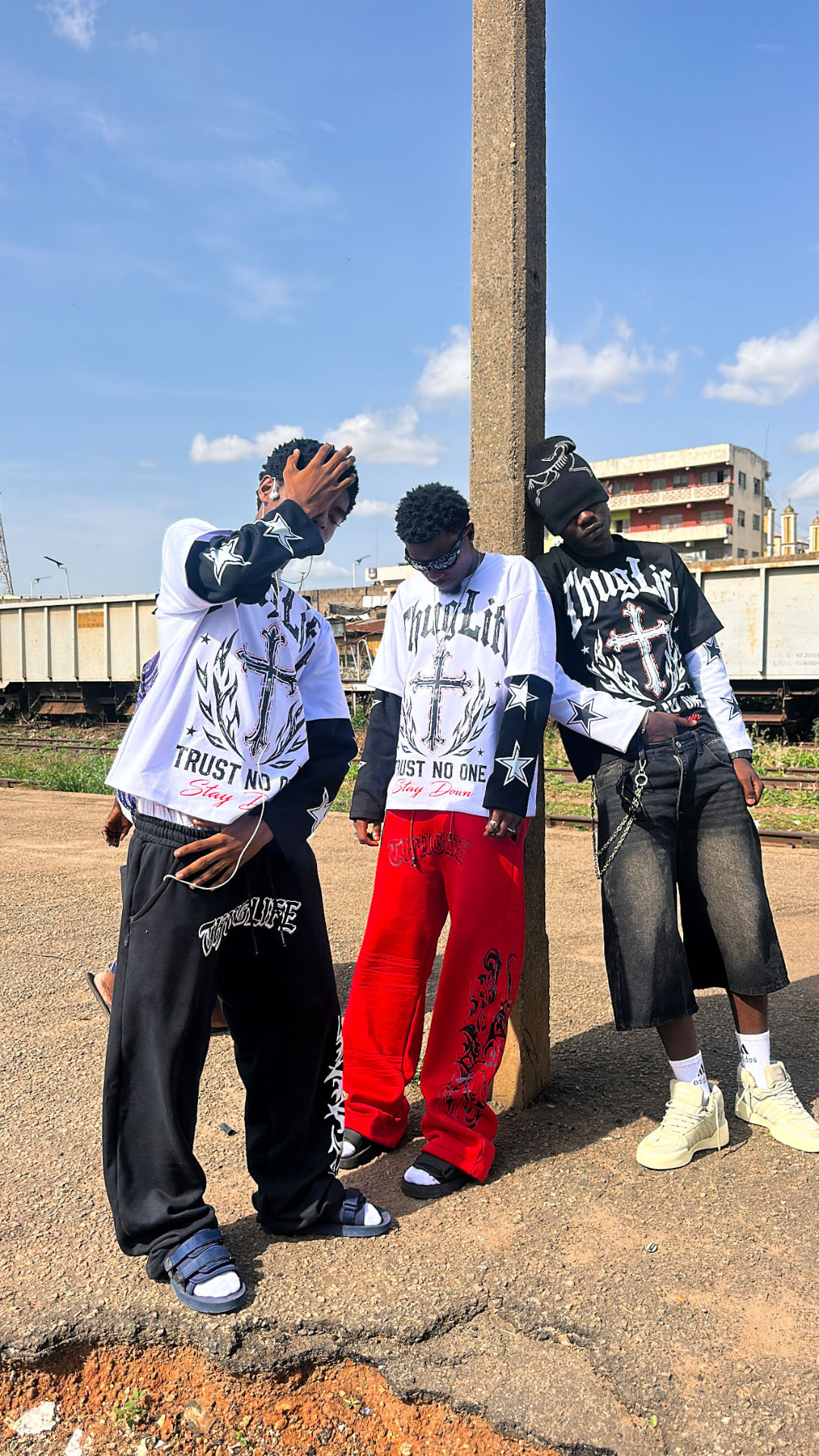 Friends wearing THUGLIFE Trust No One tees